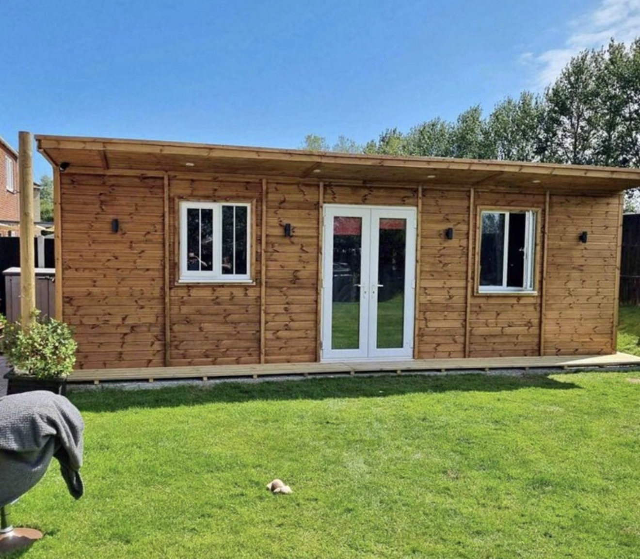 Completed timber garden room by Grapes Building Services in Cheshire