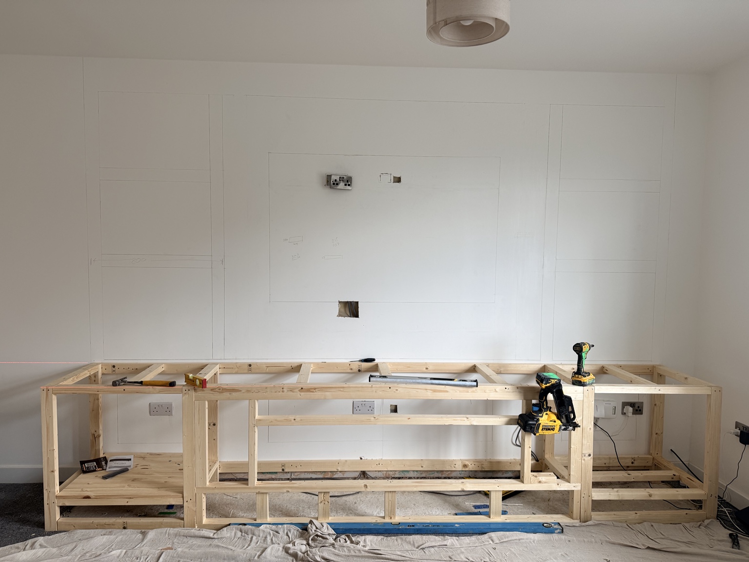 Base timber framework and marked-out media wall design